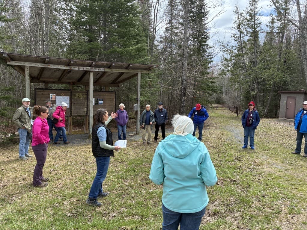 Sara Hudson describing the Jerry Jolly Recreation Area to field trip participants on Star Route Road in Bayfield County