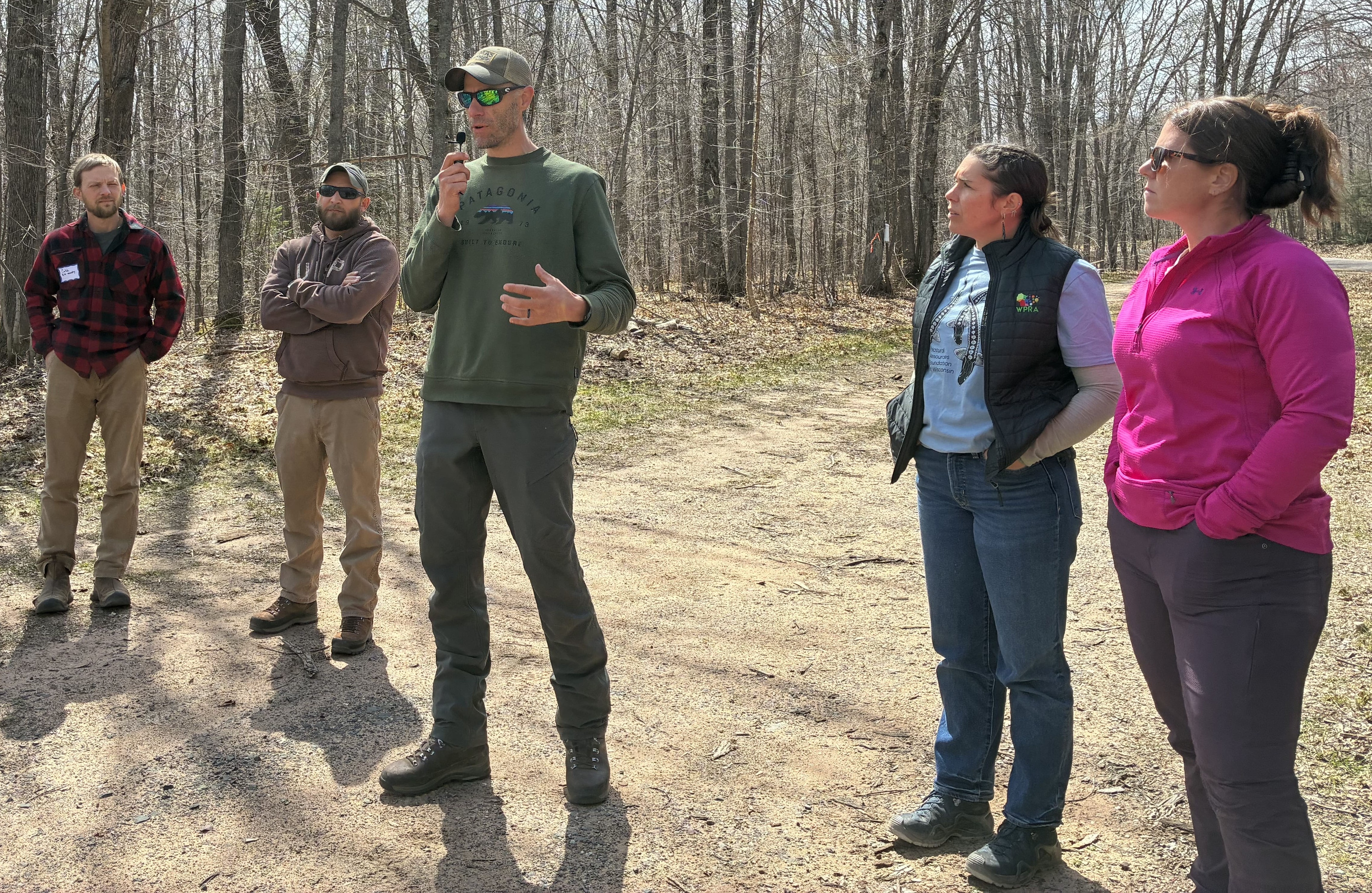Bayfield County Forestry and Parks staff gathered at the Star Route Parking Lot with field trip participants