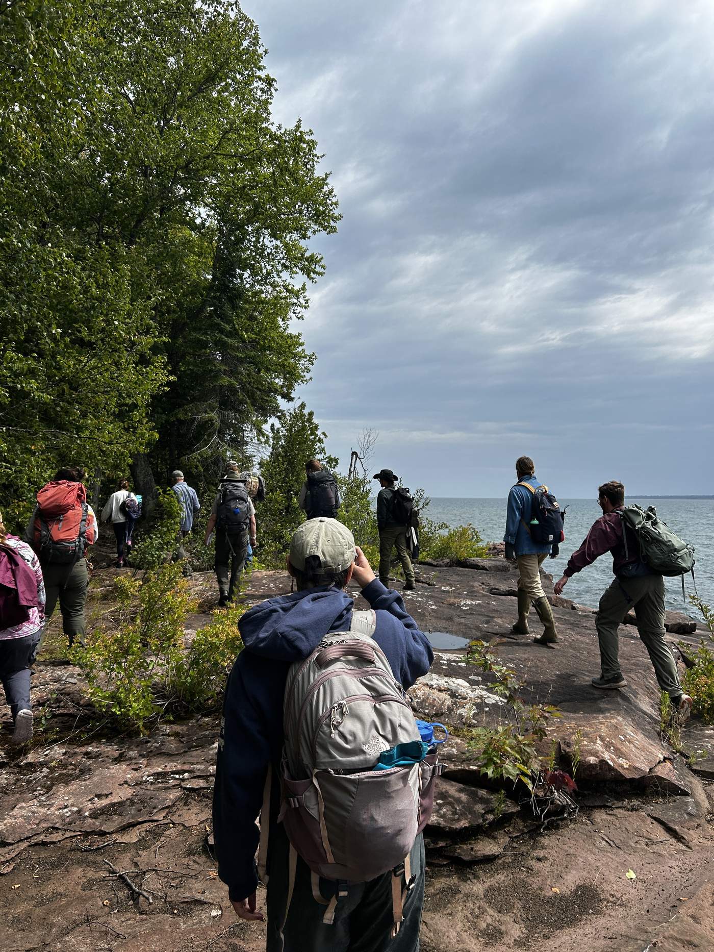 Participants hiking the shoreline of Stockton Island in the Apostle Islands National Lakeshore