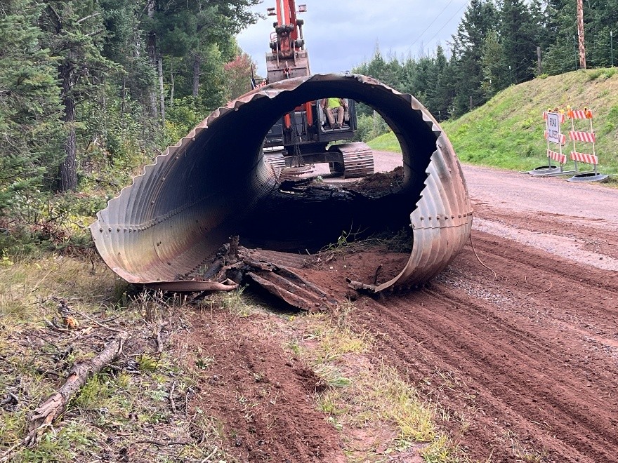 Close-up of culvert floor erosion and piping failure at Happy Creek